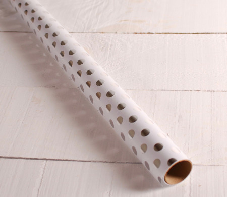 Papel de regalo con topos de foil