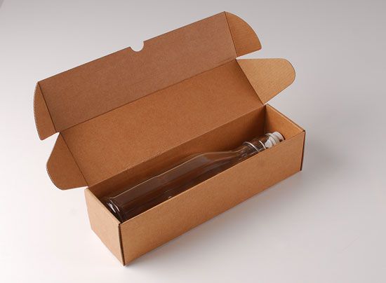 Botella de cristal para agua con tapón mecánico
