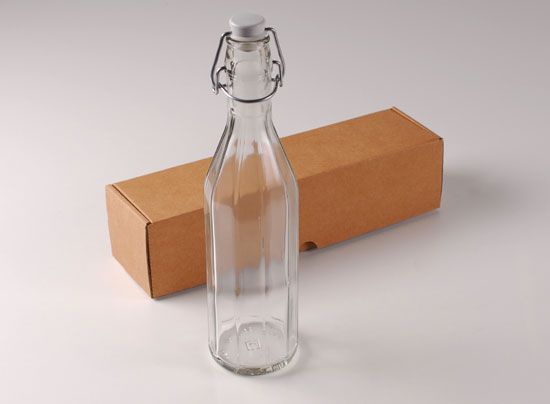 Botella de cristal para agua con tapón mecánico